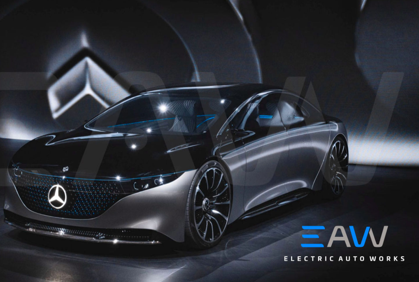 A sleek black car with a black backgrund Electric Auto Works.