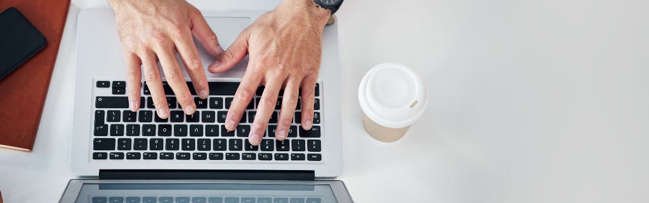 someone typing in a computer