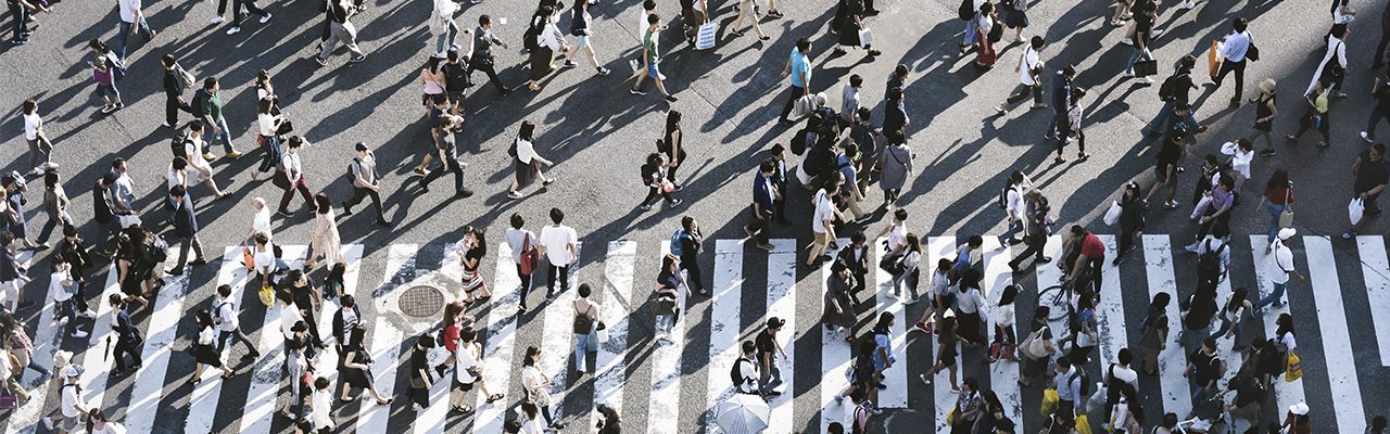 zenithal view crowd of people walking in the street