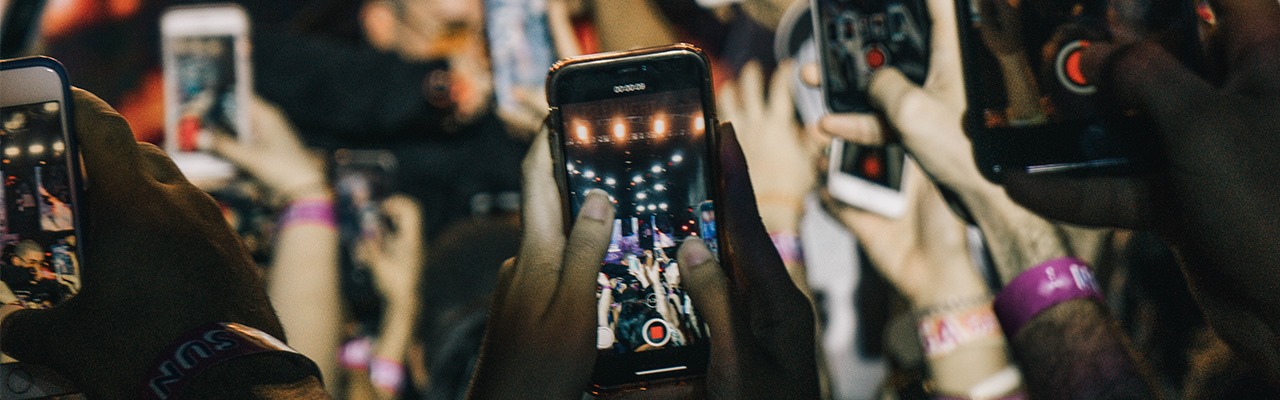 group-of-people-using-their-phones-camera